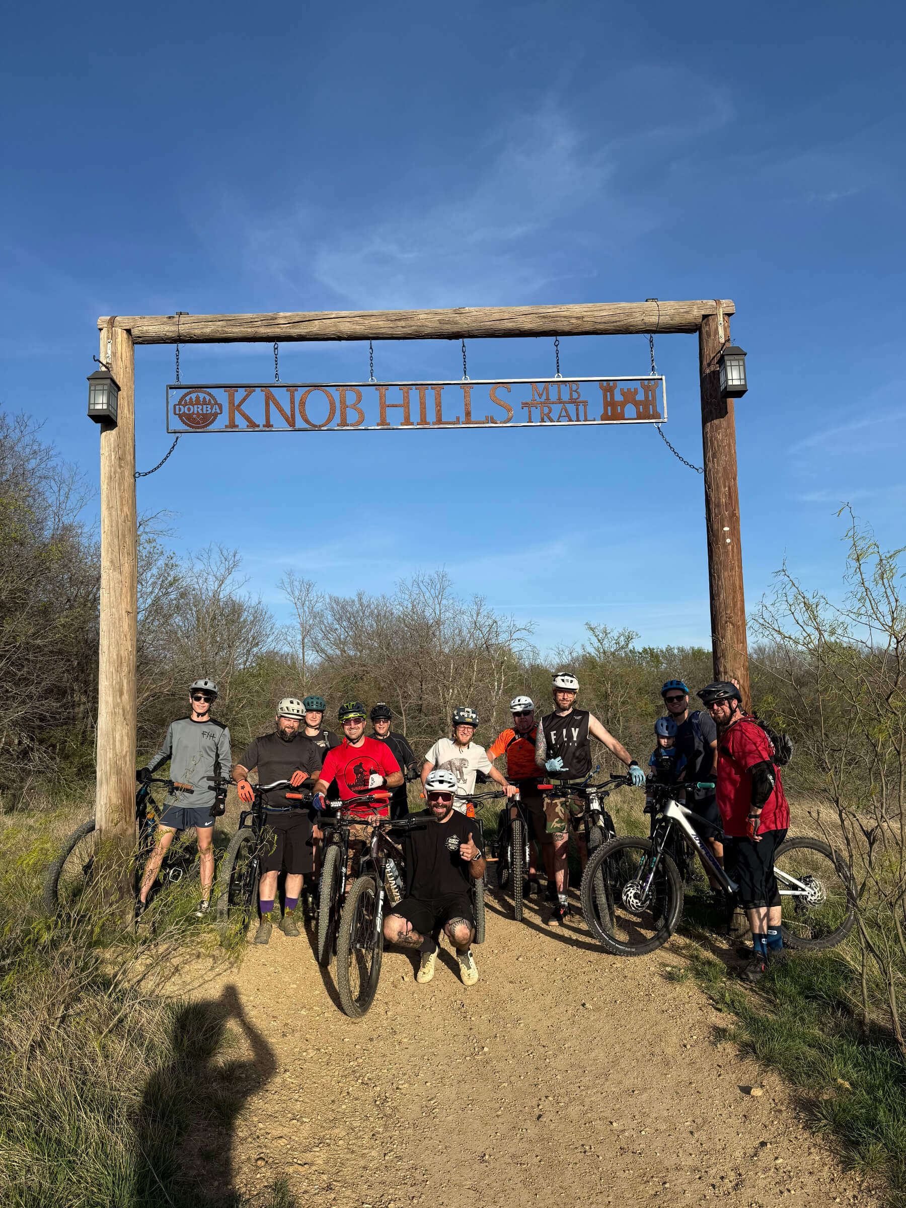 group of bike riders at trailhead